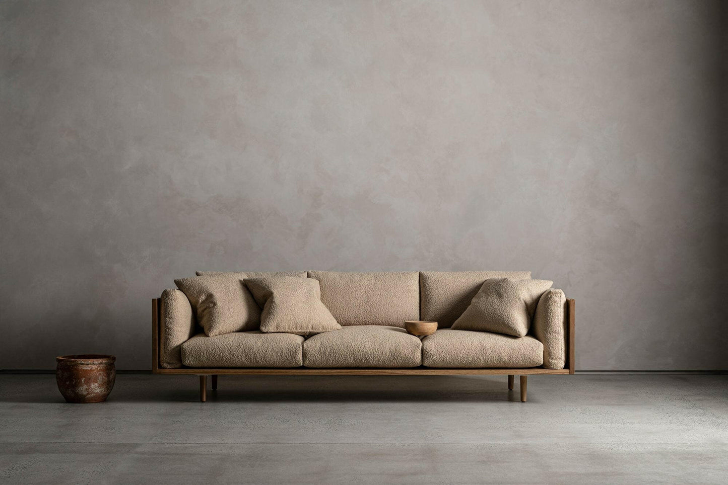 WOOD ENCASED SOFA.