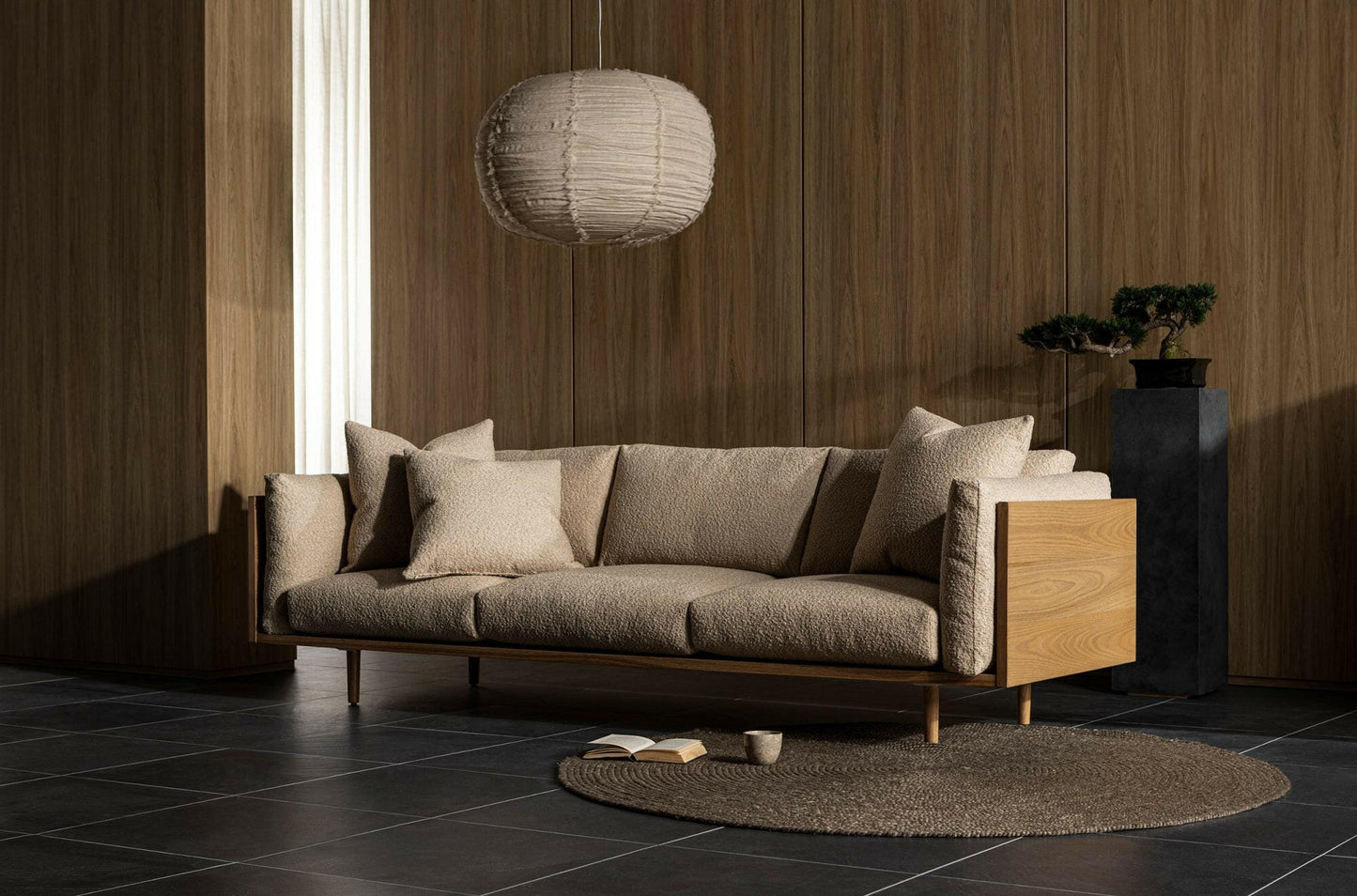 WOOD ENCASED SOFA.