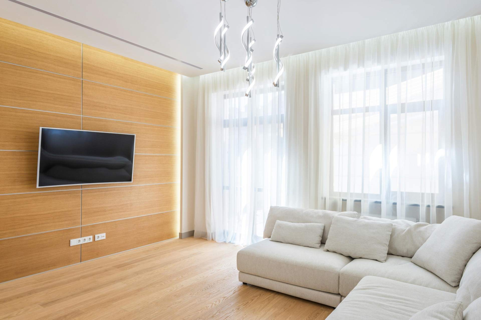 Elegant sheer curtains in a modern Dubai living room