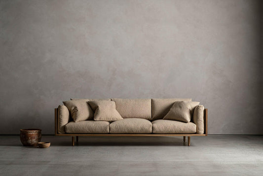 WOOD ENCASED SOFA.